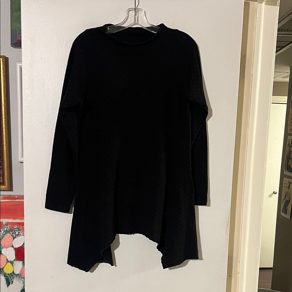 Matthildur mock turtleneck handkerchief hem long sleeve tunic. Diamond pattern
